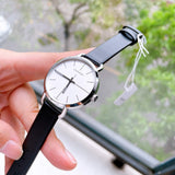  Shop Authentic Calvin Klein Evan White Dial Black Leather Strap Watch for Women - K7B231CY - Luxxuri