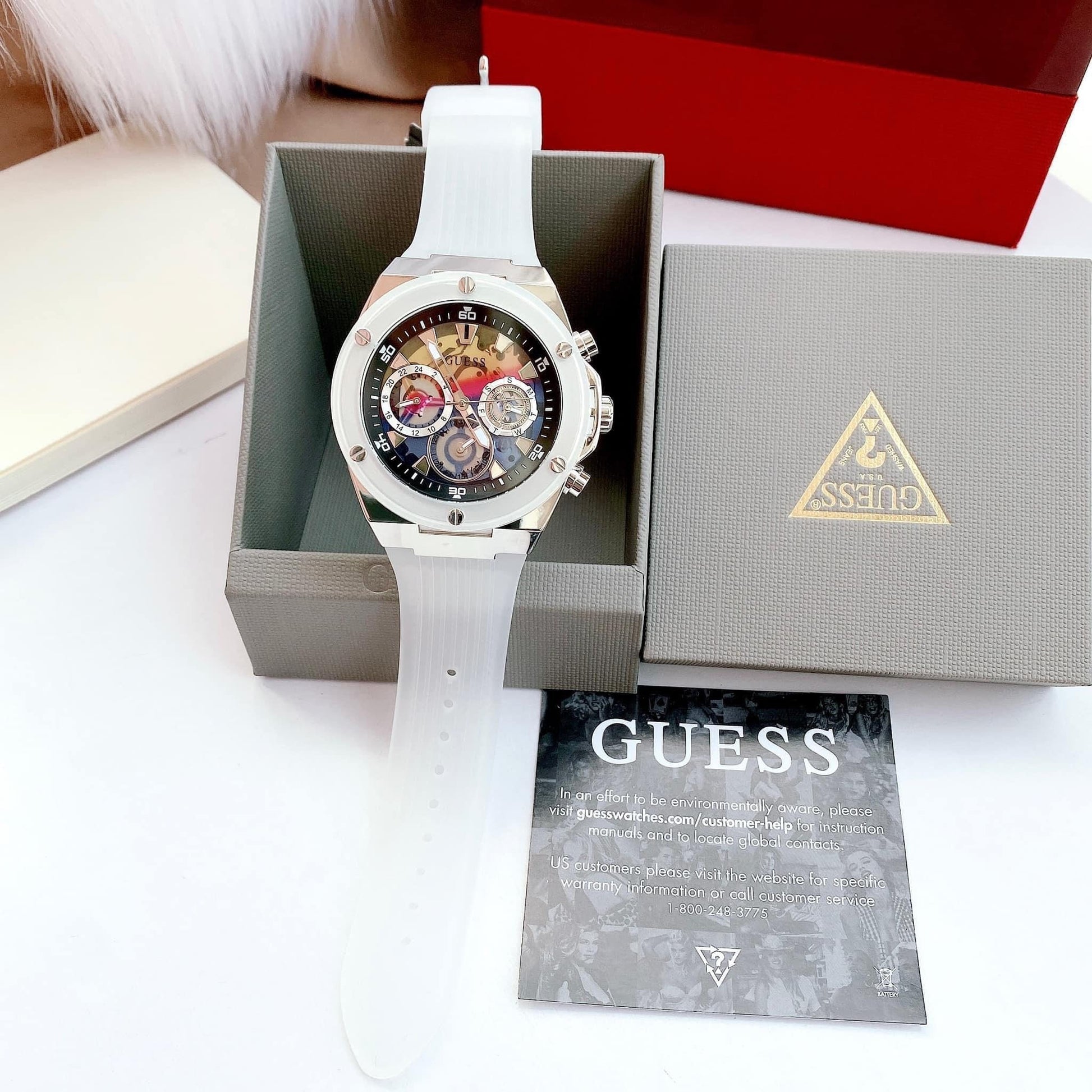  Shop Authentic Guess Poseidon Chronograph Rainbow Dial White Silicone Strap Watch For Men - GW0425G4 - Luxxuri