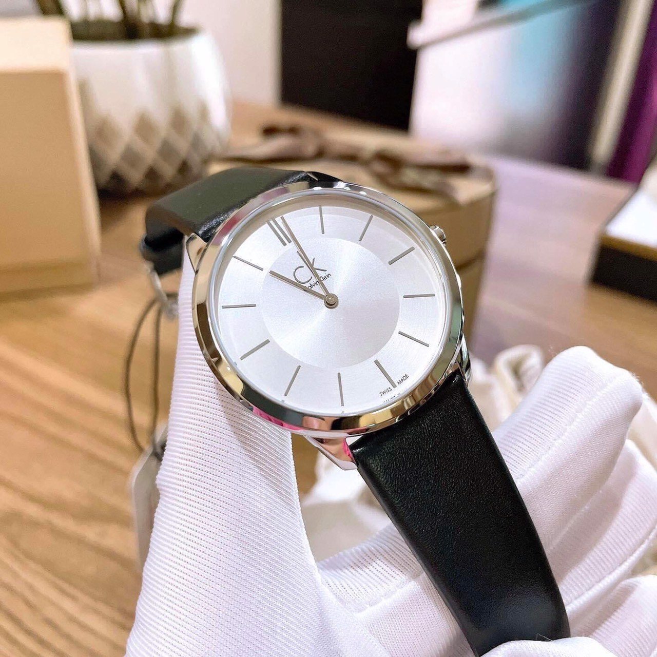 Shop Authentic Calvin Klein Minimalist White Dial Black Leather Strap Watch for Men - K3M211C6 - Luxxuri