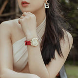  Shop Authentic Guess Cosmo Diamonds Gold Dial Red Rubber Strap Watch for Women - GW0034L6 - Luxxuri