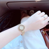  Shop Authentic Guess Dream Crystals Rose Gold Dial Rose Gold Mesh Bracelet Watch For Women - GW0550L3 - Luxxuri