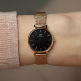  Shop Authentic Daniel Wellington Petite Pressed Melrose Black Dial Rose Gold Mesh Strap Watch For Women - DW00100440 - Luxxuri