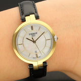  Shop Authentic Tissot Flamingo Mother of Pearl White Dial Black Leather Strap Watch For Women - T094.210.26.111.00 - Luxxuri
